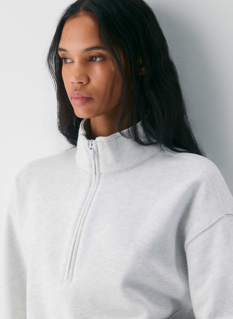 gemütlicher boyfriend-sweatfleece-pullover mit 12-reißverschluss meliertes weiß