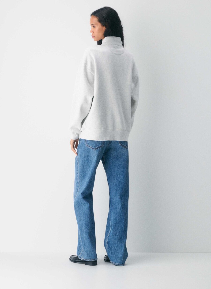 gemütlicher boyfriend-sweatfleece-pullover mit 12-reißverschluss meliertes weiß