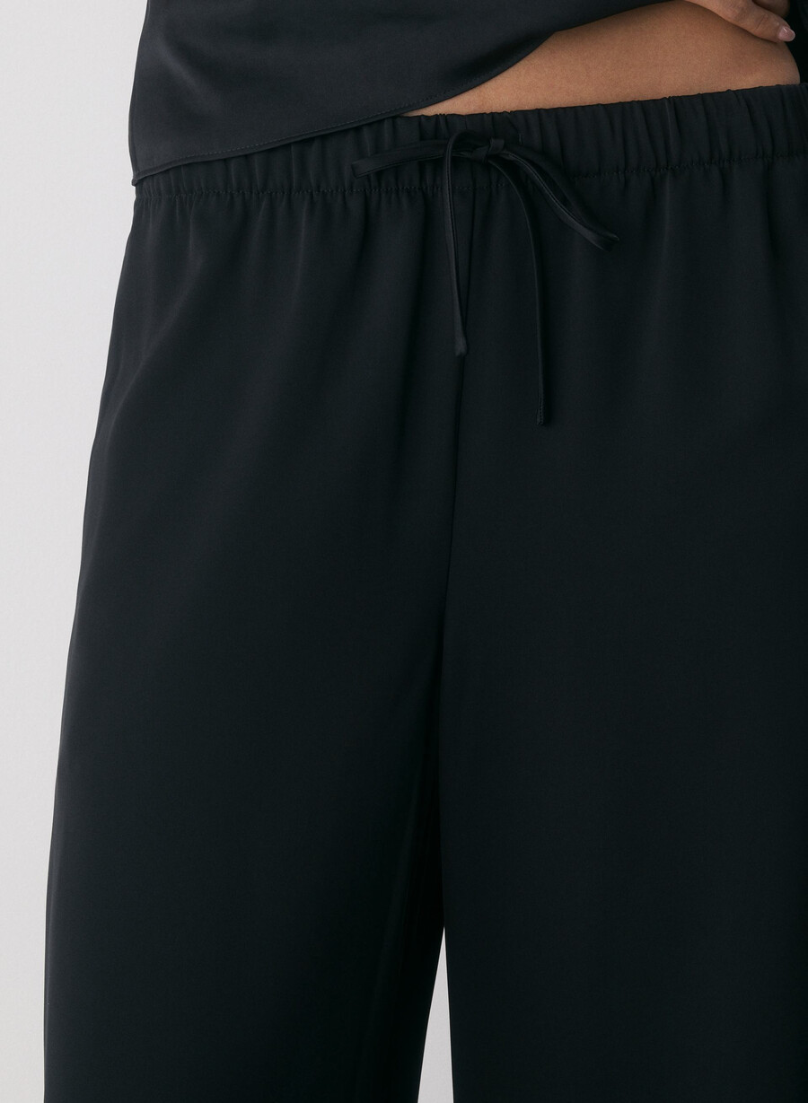 die lodge pant – satin schwarz