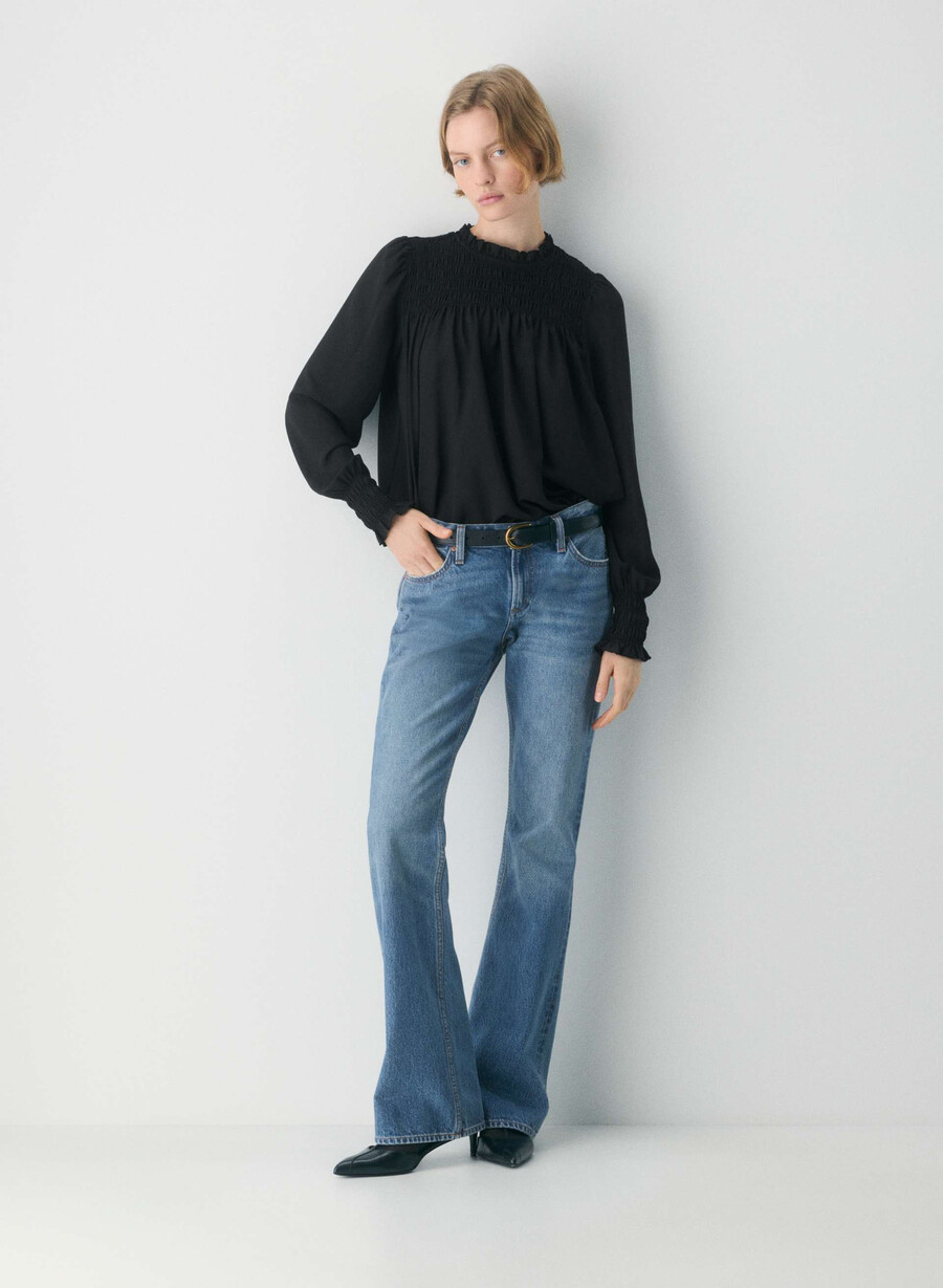 bluse aus schwarzem stoff
