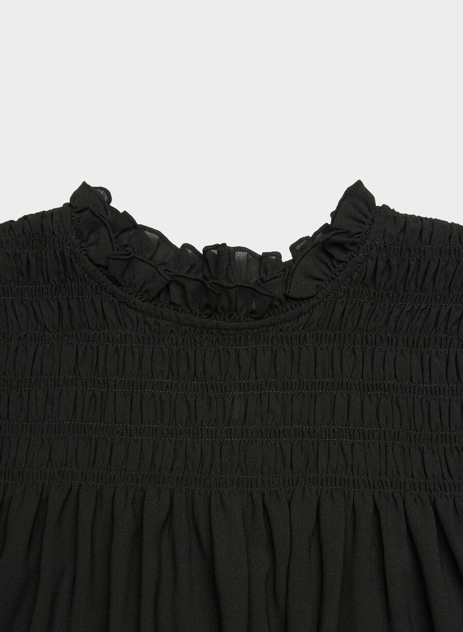 bluse aus schwarzem stoff