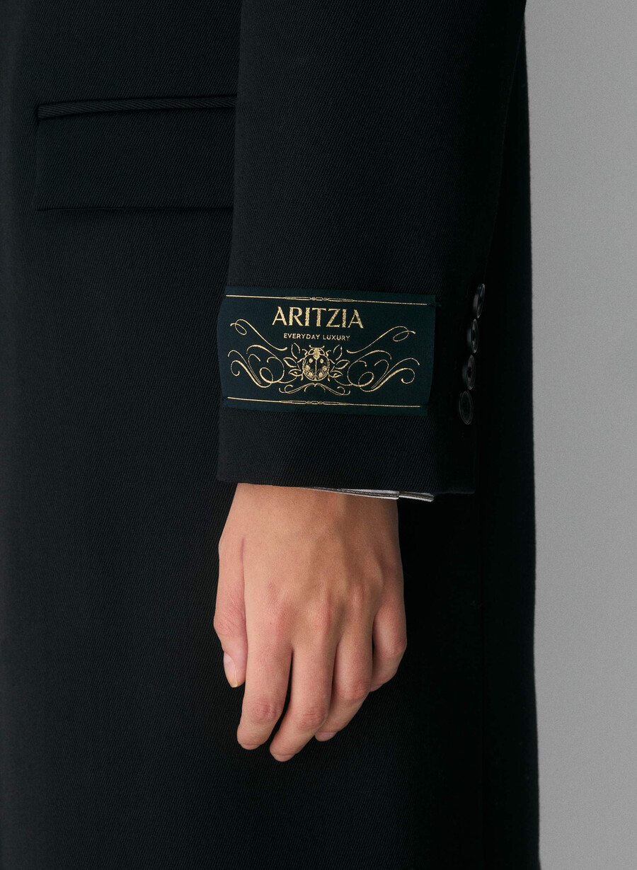 the genre mantel schwarz