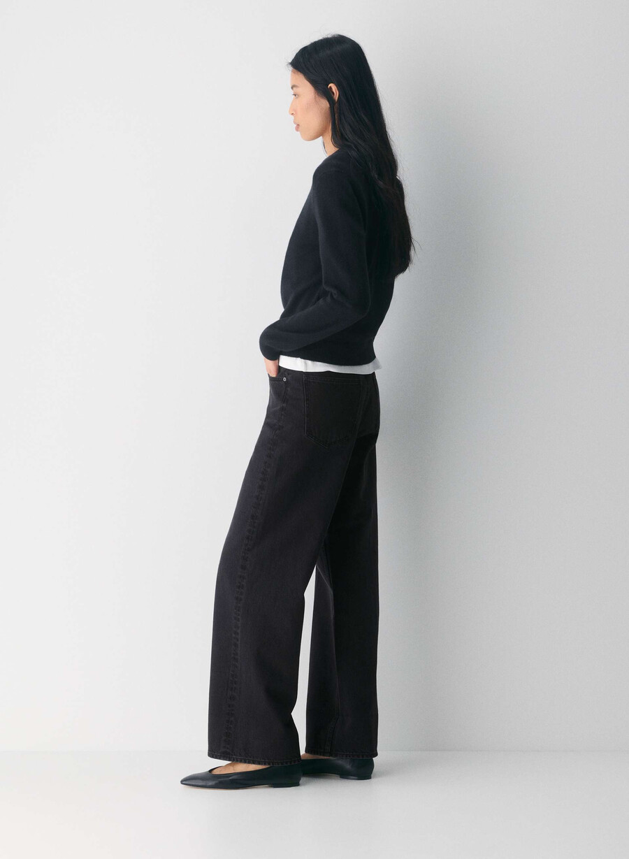 denim forum vintage-jeans der 90er mit niedrigem bund und umschlag schwarzer eyeliner
