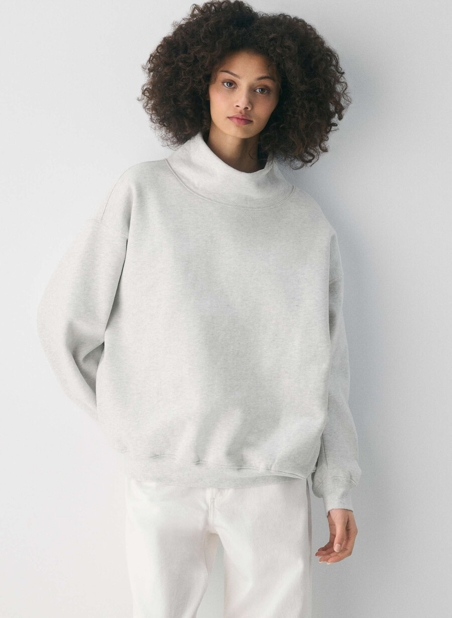 kuscheliger fleece-pullover mit großem stehkragen meliertes weiß