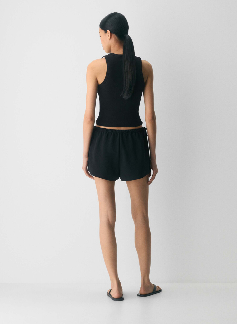 artisan short - crepette schwarz