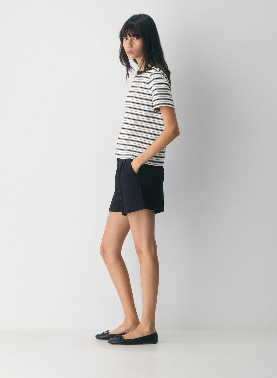 die mühelose short mid-thigh - crepette schwarz