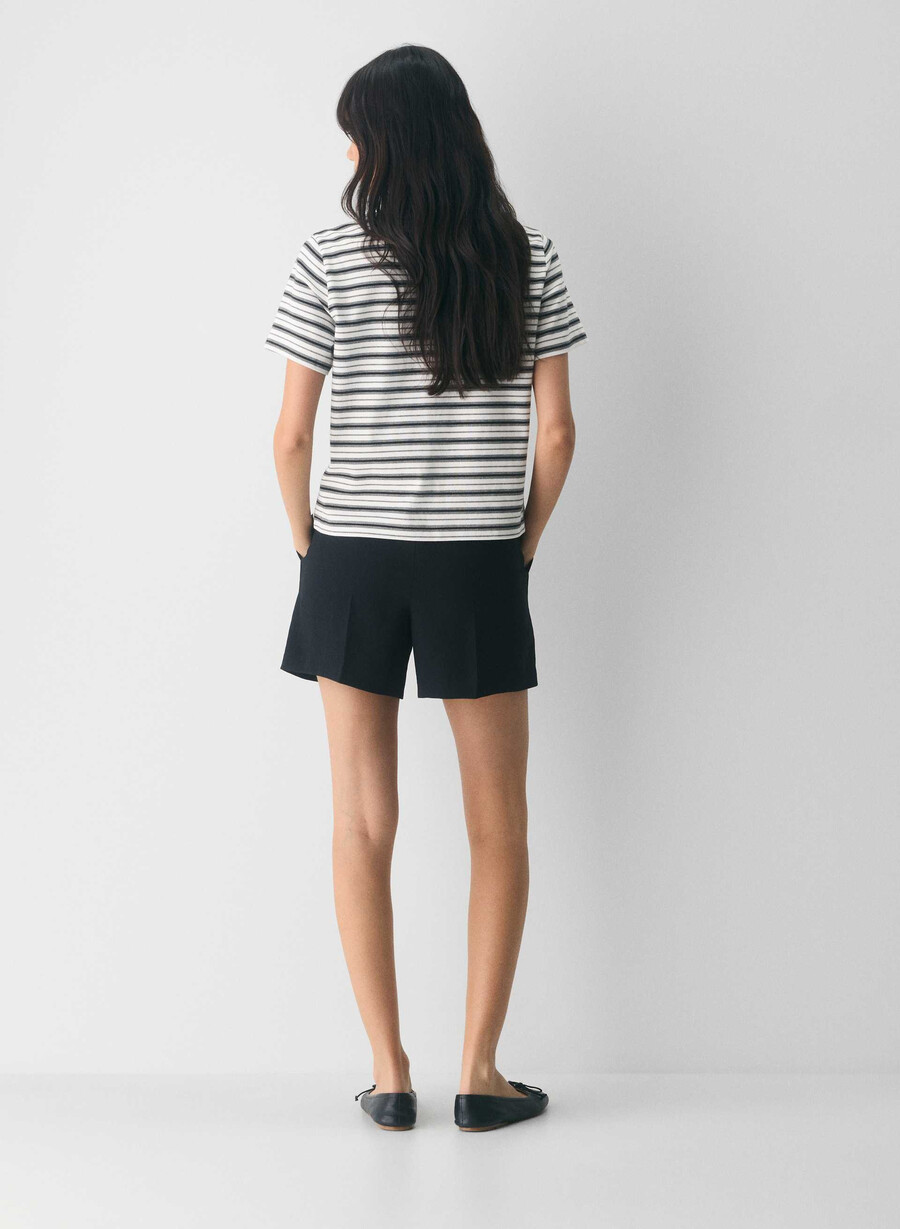 die mühelose short mid-thigh - crepette schwarz