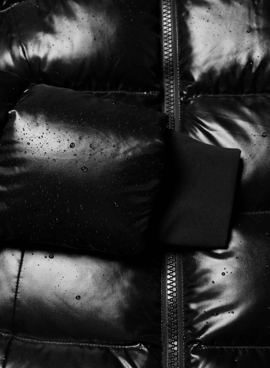 supersnug puff long – hochglanz schwarz