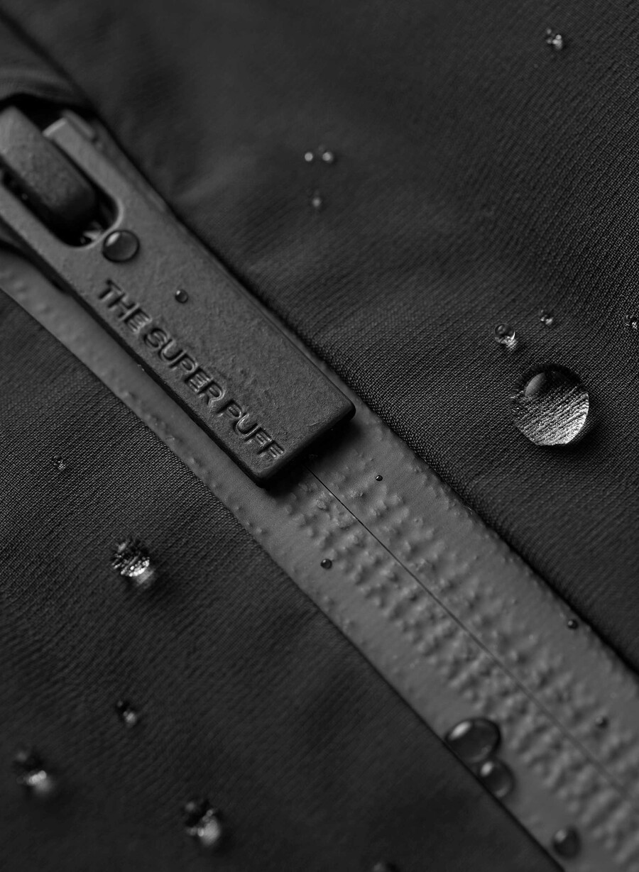 der supersnug puff₂o - rainstop schwarz
